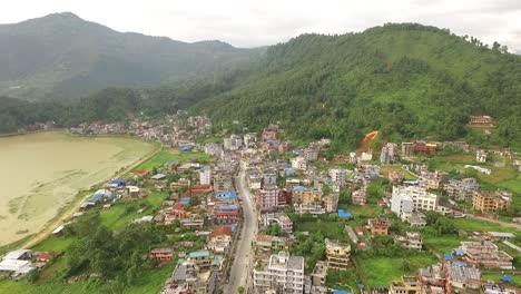 An-aerial-view-shows-the-city-of-Pokhara-Nepal-and-its-surrounding-mountains