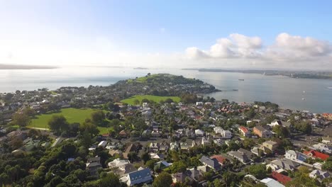 An-aerial-view-shows-Mount-Victoria-and-nearby-dwellings-in-Auckland-New-Zealand