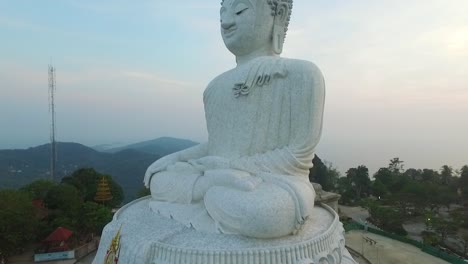 An-aerial-view-shows-The-Great-Buddha-of-Phuket-located-in-Phuket-Thailand-at-sunset-1
