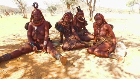 Himba-tribal-women-show-off-their-mud-hair-extensions-and-unusual-braided-dreadlocked-hairstyles-3