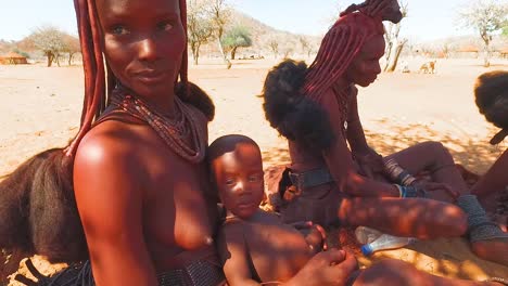 Himba-tribal-women-show-off-their-mud-hair-extensions-and-unusual-braided-dreadlocked-hairstyles-5