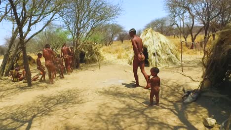 African-San-tribal-bushmen-perform-a-fire-dance-in-a-small-primitive-village-in-Namibia-Africa-4