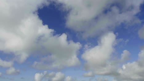 Time-lapse-of-clouds-against-blue-sky-moving-forward-3