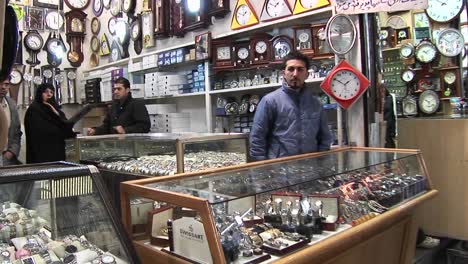 A-vendor-sells-clocks-in-a-bazaar-in-Iran-
