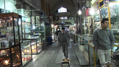 A-shoppers-pass-through-a-bazaar-in-Iran-2