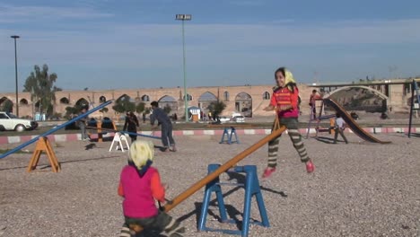 Children-play-on-a-seesaw-in-Iran-1