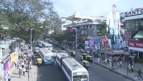 Time-lapse-view-of-traffic-and-pedestrians-traveling-down-a-busy-street