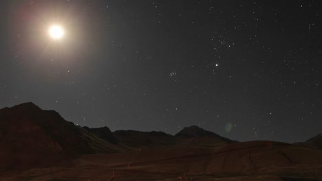 Aconcagua-Time-Lapse--Moon-traveling-across-mountain-sky