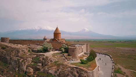 Aerial-of-a-beautiful-traditional-church-in-the-Caucasus-mountains-of-Armenia