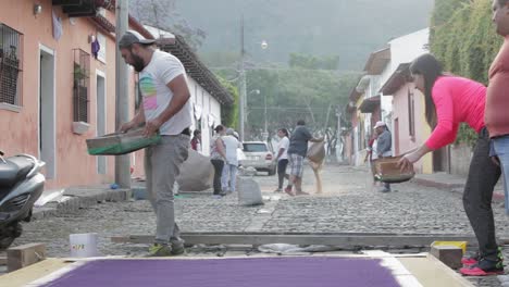 Locals-decorate-an-alfombra-or-carpet-during-Semana-Santa-Easter-week-in-Antigua-Guatemala-4