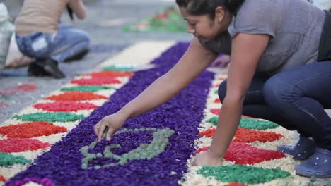 Locals-decorate-an-alfombra-or-carpet-during-Semana-Santa-Easter-week-in-Antigua-Guatemala-7