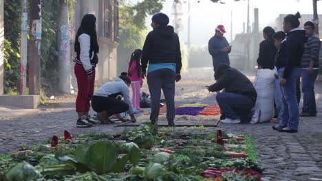 Locals-decorate-an-alfombra-or-carpet-during-Semana-Santa-Easter-week-in-Antigua-Guatemala-8