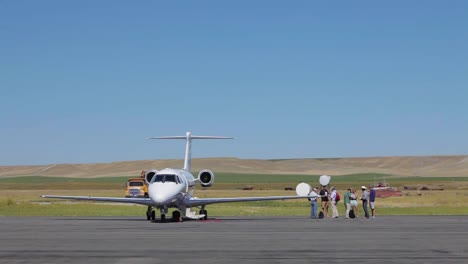 A-private-jet-on-a-parking-pad-at-a-private-airfield-in-Deer-Lodge-Montana