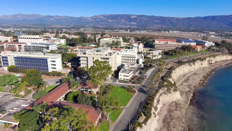 Aerial-of-the-University-of-California-Santa-Barbara-UCSB-college-campus-with-Storke-Tower-distant-and-research-buildings-1