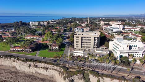 Aerial-of-the-University-of-California-Santa-Barbara-UCSB-college-campus-with-Storke-Tower-distant-and-research-buildings-2