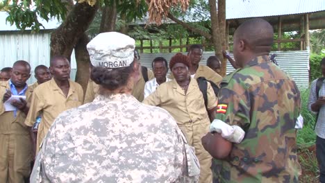 Africans-In-A-Village-In-Uganda-Are-Helped-By-Members-Of-The-Us-Military-To-Cope-With-Ebola-5
