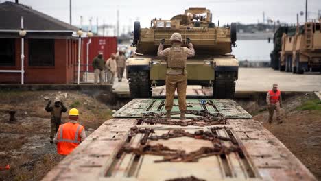 Us-Military-Gear-Is-Loaded-On-To-Railcars-And-Prepared-For-Cross-Country-Transport-10