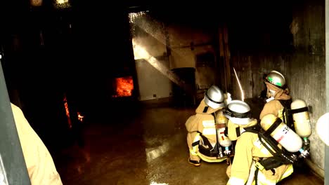 Firefighters-Battle-A-Practice-Fire-In-Closed-Quarters
