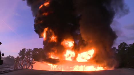 Firefighters-Battle-A-Raging-Chemical-Fire-In-A-Simulated-Airplane-Crash
