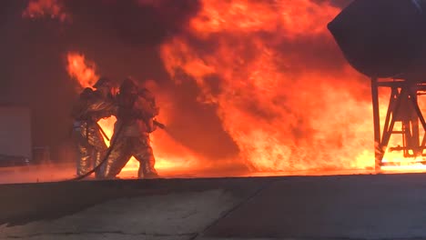 Firefighters-Battle-A-Raging-Chemical-Fire-In-A-Simulated-Airplane-Crash-6