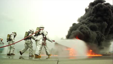 Firefighters-Battle-A-Raging-Chemical-Fire-In-A-Simulated-Airplane-Crash-13