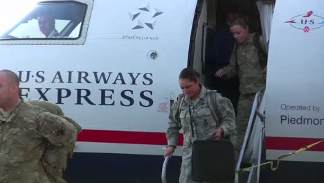 Us-Servicemen-And-Women-Are-Welcomed-Home-In-An-Airport-After-A-Recent-Deployment-To-Afghanistan-1