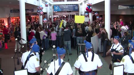 Us-Servicemen-And-Women-Are-Welcomed-Home-In-An-Airport-After-A-Recent-Deployment-To-Afghanistan-4