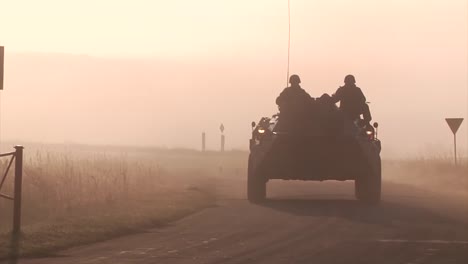 A-Large-Mobilization-Of-Tanks-And-Humvees-Move-Across-The-European-Countryside