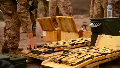 Soldiers-Arm-Themselves-With-Live-Ammunition-As-They-Head-Into-The-Field-In-Afghanistan