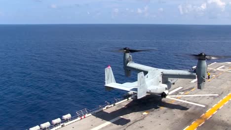 Various-Shots-Of-The-Osprey-Helicopter-Taking-Off-From-The-Deck-Of-An-Aircraft-Carrier