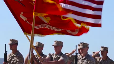 Marine-Corps-Troops-Salute-In-A-Ceremony-On-A-Runway-At-An-Airbase