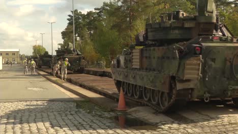 Tanks-Are-Loaded-Onto-A-Train-By-Us-Military-Personnel-In-Germany