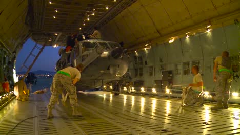 An-Hh60-Pavehawk-Helicopter-Is-Loaded-Onto-A-C5-Galaxy-Transport-Plane-At-Nellis-Air-Force-Base-For-Shipment-To-Afghanistan-1