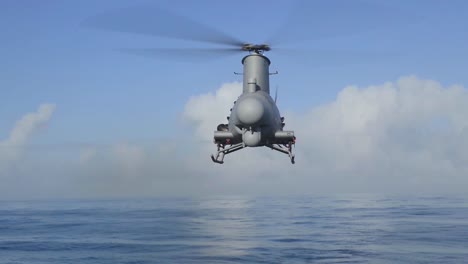 A-Fire-Scout-Drone-Helicopter-Is-Launched-From-The-Deck-Of-An-Aircraft-Carrier