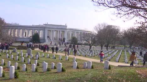People-Lay-Christmas-Wreaths-On-Soldiers-Graves-In-Arlington-Cemetery