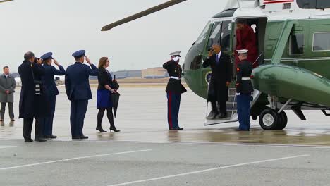 President-Barack-Obama-And-Michelle-Obama-Exit-A-Helicopter-And-Are-Warmly-Greeted-By-Members-Of-The-Military