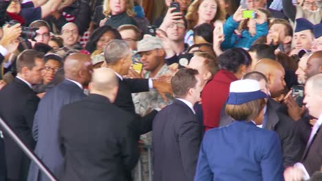 President-Barack-Obama-And-Michelle-Obama-Are-Warmly-Greeted-By-Members-Of-The-Military