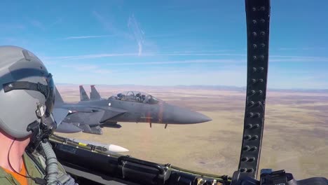 Pov-From-Inside-Of-A-Fighter-Jet-As-It-Flies-In-Formation