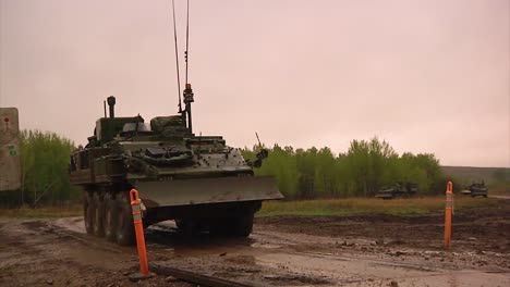 An-Canadian-Army-Tank-Crosses-A-Bridge