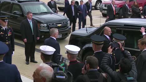 Steve-Bannon-Watches-As-President-Donald-Trump-And-Vice-President-Mike-Pence-Emerge-From-A-Limousine-And-Enter-The-Fdepartrment-Of-Defense-Building-In-Washington-Dc