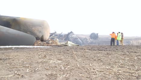 Field-Investigators-From-The-Ntsb-Investigate-An-Oil-Tanker-Train-Wreck-Crash-Near-Graettinger-Iowa-6