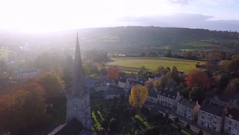 An-Aerial-Shot-Of-A-Town-In-The-Uk-Has-A-Church-As-Its-Focal-Point