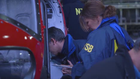 Ntsb-Investigators-Inspect-A-Damaged-Helicopter-Which-Crashed-Into-The-East-River-New-York-City