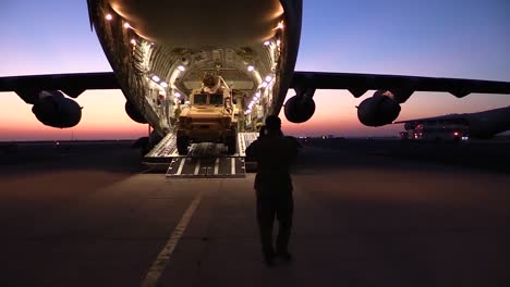A-Military-Vehicle-Is-Driven-Onto-A-C17-Cargo-Carrier