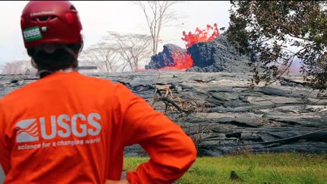 Researchers-From-The-Usgs-Watch-As-Lava-Flows-Across-A-Road-In-Hawaii-During-The-2018-Kilauea-Volcano-Eruption