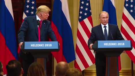 Us-President-Donald-Trump-Holds-A-Disastrous-And-Much-Criticized-Press-Conference-With-Russia-Federation-Vladimir-Putin-Following-Their-Summit-In-Helsinki-Finland-Putin-Gives-Trump-A-Soccer-Ball-As-A-Gift