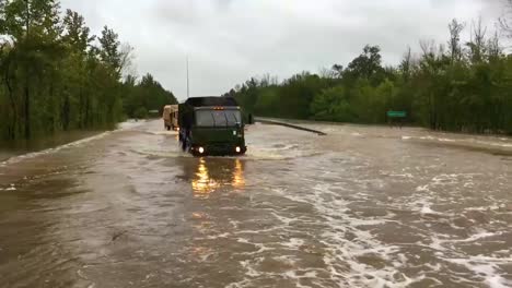 National-Guard-Vehicles-Move-Through-Flooded-Roads-During-Hurricane-Florence