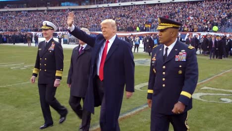 Us-President-Donald-Trump-Attends-The-Army-Navy-College-Football-Game-Flips-Coin-Waves-To-Spectators