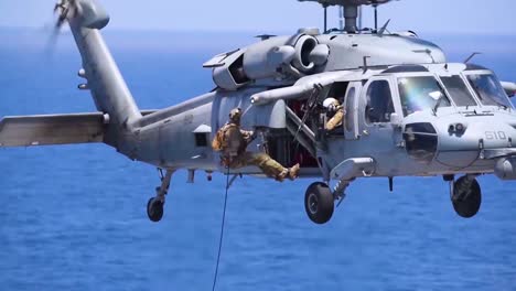 Navy-Fastrope-Exercise-Features-Soldiers-Rapelling-From-A-Hovering-Helicopter-On-The-Flight-Deck-Aboard-Uss-Harry-S-Truman-Aircraft-Carrier