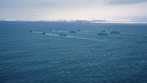 Aerial-Shot-Of-The-Norwegian-Navy-Patrolling-Northern-Waters-In-Winter